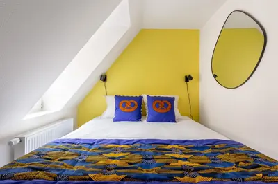 Un ou plusieurs lits dans un hébergement de l'établissement Travel Homes - Republic, charm in the heart of Colmar