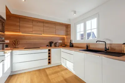 Cuisine ou kitchenette dans l'établissement Vignes & Tropiques - Terrasse - Wifi - Clim - Parking