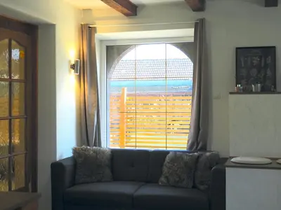 Coin salon dans l'établissement Le Refuge 