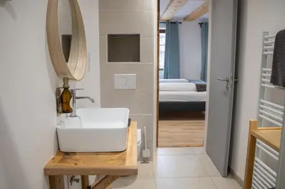 Un ou plusieurs lits dans un hébergement de l'établissement Chambre Super Broussard
