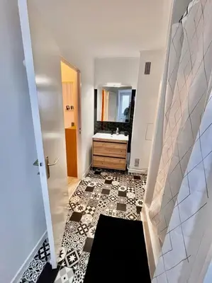 Télévision ou salle de divertissement dans l'établissement Charmant studio en vieille Ville de Belfort