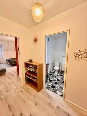 Un ou plusieurs lits dans un hébergement de l'établissement Charmant studio en vieille Ville de Belfort