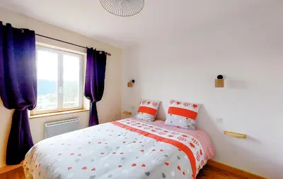 Un ou plusieurs lits dans un hébergement de l'établissement Lovely Home In Gérardmer With Kitchen