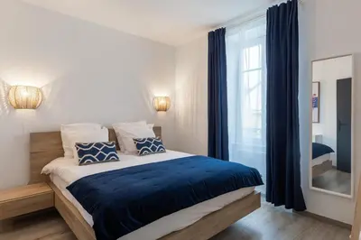 Un ou plusieurs lits dans un hébergement de l'établissement Travel Homes - Niffel 3 - Un havre de paix près du Parc