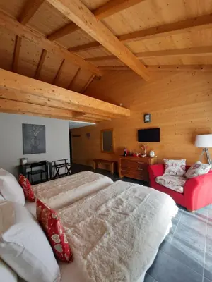 Un ou plusieurs lits dans un hébergement de l'établissement Au Cœur des Lacs - Chambres d'hôtes