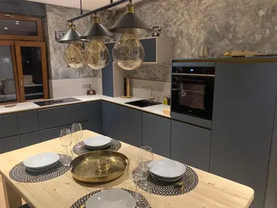 Cuisine ou kitchenette dans l'établissement Édouard & Richard