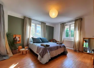 Un ou plusieurs lits dans un hébergement de l'établissement Rooms 4 persons Kaysersberg