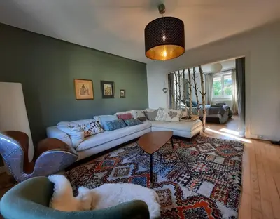Coin salon dans l'établissement Rooms 4 persons Kaysersberg