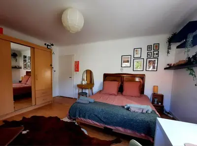 Un ou plusieurs lits dans un hébergement de l'établissement Rooms 4 persons Kaysersberg