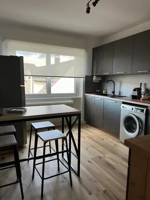 Cuisine ou kitchenette dans l'établissement Location chez marie