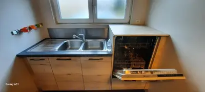 Cuisine ou kitchenette dans l'établissement Le refuge aux Papillons