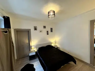 Un ou plusieurs lits dans un hébergement de l'établissement Charmant appartement de 3 pièces, Colmar