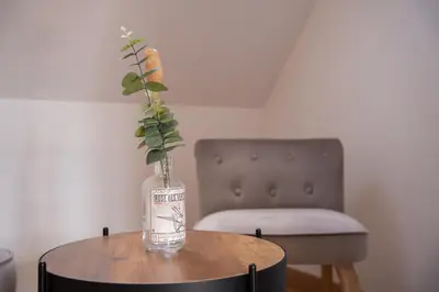 Coin salon dans l'établissement Chambre Rose des Vents