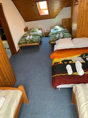 Un ou plusieurs lits dans un hébergement de l'établissement Appartement duplex
