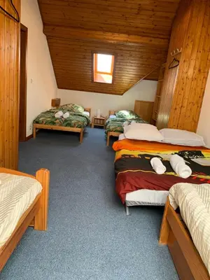 Un ou plusieurs lits dans un hébergement de l'établissement Appartement duplex