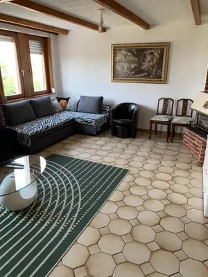 Coin salon dans l'établissement Appartement duplex
