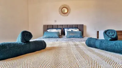 Un ou plusieurs lits dans un hébergement de l'établissement Le City View - Calme - Moderne - Balcon - RelaxBNB