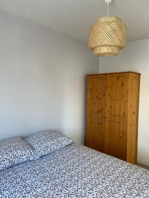 Un ou plusieurs lits dans un hébergement de l'établissement F3 Superbe vue lac, grand balcon, ambiance nature