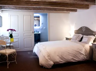 Un ou plusieurs lits dans un hébergement de l'établissement Chambre Le Hupsa Pfannala