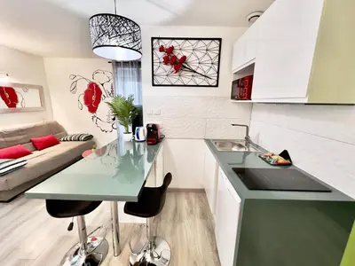 Coin salon dans l'établissement Le Coquelicot - Proche Gare - Studio 1 pièce 2 Pers