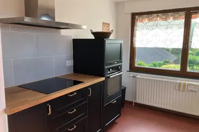 Cuisine ou kitchenette dans l'établissement Gite des Hauts Jardins