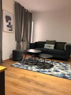 Coin salon dans l'établissement Élégant F2 luxueux proche Suisse