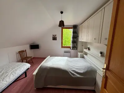 Un ou plusieurs lits dans un hébergement de l'établissement Chalet Au fil de l'eau