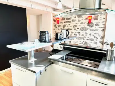 Cuisine ou kitchenette dans l'établissement APPARTEMENT DUPLEX