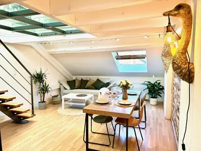 Coin salon dans l'établissement APPARTEMENT DUPLEX