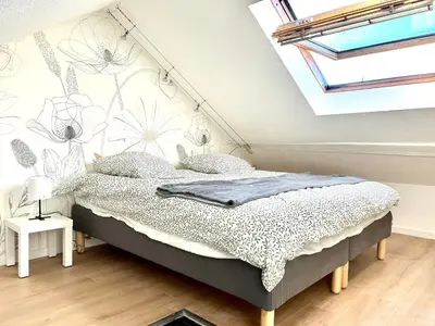 Un ou plusieurs lits dans un hébergement de l'établissement APPARTEMENT DUPLEX