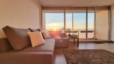 Coin salon dans l'établissement Dreamy Suite for Sunsetlovers