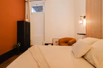 Un ou plusieurs lits dans un hébergement de l'établissement Appartement haut de gamme à Belfort idéal business & détente