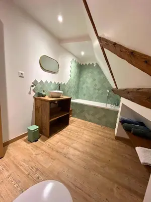 Un ou plusieurs lits dans un hébergement de l'établissement La p'tite maison