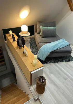 Un ou plusieurs lits dans un hébergement de l'établissement Charmant Cottage de village
