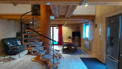Coin salon dans l'établissement Chalet bambi