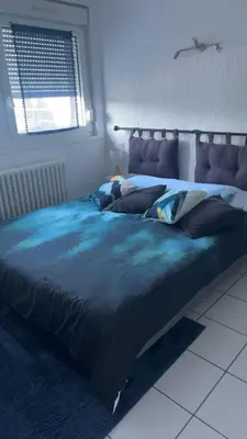 Un ou plusieurs lits dans un hébergement de l'établissement Appartement sur les hauteurs de Gérardmer