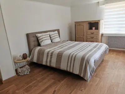 Un ou plusieurs lits dans un hébergement de l'établissement Appartement 