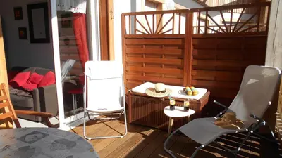 Coin salon dans l'établissement Gérardmer : appartement 43m2, classé 3*, vue lac