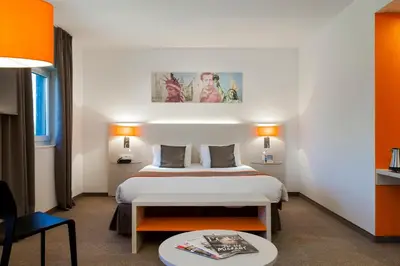 Un ou plusieurs lits dans un hébergement de l'établissement Best Western Colmar Expo
