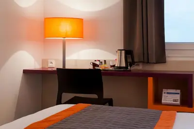 Un ou plusieurs lits dans un hébergement de l'établissement Best Western Colmar Expo