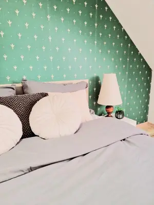 Un ou plusieurs lits dans un hébergement de l'établissement L'élémentaire, appartement chic et central