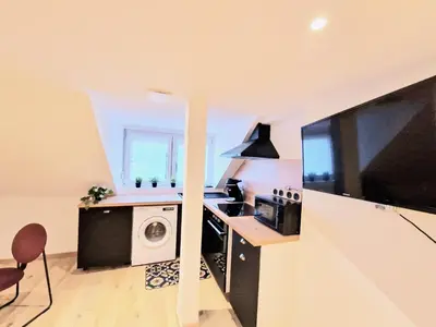 Cuisine ou kitchenette dans l'établissement L'élémentaire, appartement chic et central