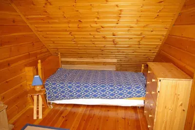 Un ou plusieurs lits dans un hébergement de l'établissement véritable chalet finlandais