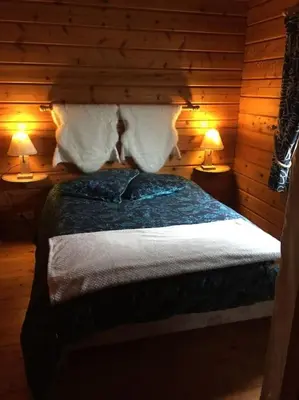 Un ou plusieurs lits dans un hébergement de l'établissement véritable chalet finlandais