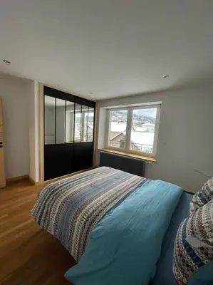 Un ou plusieurs lits dans un hébergement de l'établissement Appartement lumineux avec balcon