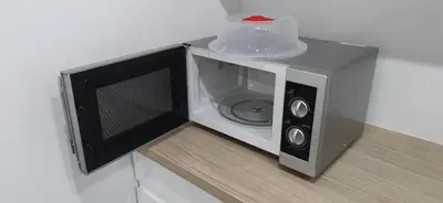 Cuisine ou kitchenette dans l'établissement Spacieux et serein avec patio, barbecue et WIFI