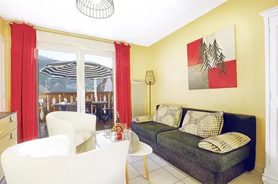 Coin salon dans l'établissement Comme Chez Soi - Vue montagne et garage privé