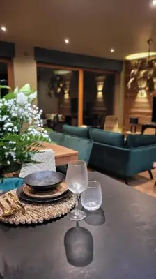 Coin salon dans l'établissement Gite 12 personnes proche Colmar