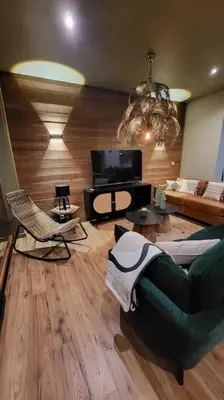 Coin salon dans l'établissement Gite 12 personnes proche Colmar