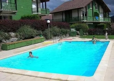 Piscine de l'établissement O' Chênes Rouges GERARDMER - 4-6 pers avec terrasse vue lac et montagne ou située à proximité